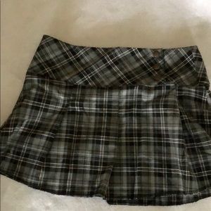 Juniors gray and black mini skirt.